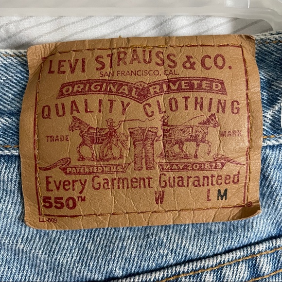 Levi’s 550 High-Rise Relaxed Fit Tapered Leg Cut Off Jeans Blue Size 10 reg Med - Picture 7 of 9